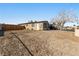 Large front yard with gravel landscaping at 1215 Ferguson Ave, North Las Vegas, NV 89030