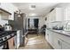 Kitchen with stainless steel appliances and dining area at 1215 Ferguson Ave, North Las Vegas, NV 89030