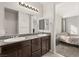 Double vanity bathroom with granite countertop at 1282 Paseo Del Oso Ln, Henderson, NV 89002