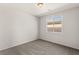 Simple bedroom with neutral wall and carpet, and a window at 1282 Paseo Del Oso Ln, Henderson, NV 89002