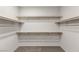 Spacious walk-in closet with ample shelving and hanging rods at 1282 Paseo Del Oso Ln, Henderson, NV 89002