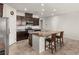 Modern kitchen with stainless steel appliances and an island at 1282 Paseo Del Oso Ln, Henderson, NV 89002