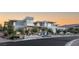 Stunning modern home with clean lines, mature landscaping, and a grand entrance at 14 Magic Stone Ln, Las Vegas, NV 89135