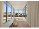 Upstairs hallway with natural light and views at 14 Magic Stone Ln, Las Vegas, NV 89135