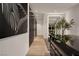 Bright walk-in closet featuring custom shelving and hardwood floors at 14 Magic Stone Ln, Las Vegas, NV 89135