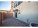 Private backyard patio with brick pavers and sliding glass door access at 1525 Spiced Wine Ave # 23103, Henderson, NV 89074