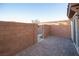 Private backyard patio with gated access and brick pavers at 1525 Spiced Wine Ave # 23103, Henderson, NV 89074