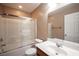 Bathroom with tub, shower, and updated vanity at 1525 Spiced Wine Ave # 23103, Henderson, NV 89074