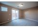 Bedroom with carpet, sliding door to patio, and neutral wall colors at 1525 Spiced Wine Ave # 23103, Henderson, NV 89074