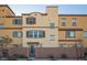 Rear view of townhouse showing private backyard and block wall at 1525 Spiced Wine Ave # 23103, Henderson, NV 89074