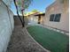 Landscaped backyard with storage shed at 1804 Discus Dr, Las Vegas, NV 89108