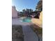 Community pool with surrounding patio and seating at 1804 Discus Dr, Las Vegas, NV 89108