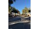 Residential street with mature trees at 1804 Discus Dr, Las Vegas, NV 89108