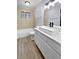 Updated bathroom with modern vanity and bathtub at 2080 Karen Ave # 49, Las Vegas, NV 89169