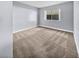 Spare bedroom with gray walls and neutral carpeting at 2080 Karen Ave # 49, Las Vegas, NV 89169