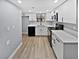 Modern kitchen with white cabinets and quartz countertops at 2080 Karen Ave # 49, Las Vegas, NV 89169