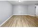 Spare room with light gray walls and wood-look flooring at 2080 Karen Ave # 49, Las Vegas, NV 89169