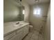 Clean bathroom with a white vanity and tiled floors at 2104 Fountain View Dr, Las Vegas, NV 89134