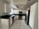 Kitchen with white cabinets, granite counters, and stainless steel appliances at 2104 Fountain View Dr, Las Vegas, NV 89134