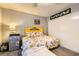 Bedroom with a queen bed and yellow headboard at 2137 Willowbury Dr # B, Las Vegas, NV 89108