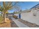 Side view of a house with walkway, gate, and carport at 2137 Willowbury Dr # B, Las Vegas, NV 89108