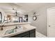 Kitchen with white tile counter tops and dark cabinets at 2137 Willowbury Dr # B, Las Vegas, NV 89108