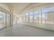 Sunroom with multiple windows and sliding glass doors at 2250 Xenia Ave, Pahrump, NV 89048