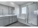 Modern bathroom with double vanity and shower at 230 Palisade Falls Ave, Henderson, NV 89015