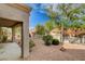 Private backyard patio with gravel and greenery at 2452 Sunup Dr, Las Vegas, NV 89134