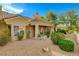 Relaxing backyard with covered patio and gravel at 2452 Sunup Dr, Las Vegas, NV 89134