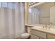 Bathroom with single vanity, toilet and shower/tub combo at 2452 Sunup Dr, Las Vegas, NV 89134