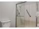 Clean bathroom with a shower and grab bars for accessibility at 2452 Sunup Dr, Las Vegas, NV 89134