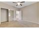 Bedroom with mirrored closet doors and adjacent storage at 2452 Sunup Dr, Las Vegas, NV 89134