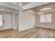 Elegant dining room featuring hardwood floors and large window at 2452 Sunup Dr, Las Vegas, NV 89134