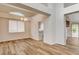 Bright dining room with hardwood floors and kitchen view at 2452 Sunup Dr, Las Vegas, NV 89134