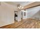 Open dining area with hardwood floors and chandelier at 2452 Sunup Dr, Las Vegas, NV 89134