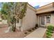 Inviting front entry with a security door and well-maintained landscaping at 2452 Sunup Dr, Las Vegas, NV 89134