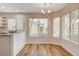 Bright kitchen nook with wood flooring and window views at 2452 Sunup Dr, Las Vegas, NV 89134