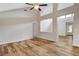 Living room with high ceilings, wood floors, and ceiling fan at 2452 Sunup Dr, Las Vegas, NV 89134