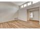 Bright living room with high ceilings and wood-look floors at 2452 Sunup Dr, Las Vegas, NV 89134