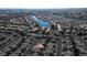 Aerial view of house and surrounding neighborhood near lake at 3109 Siena Cir, Las Vegas, NV 89128