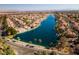 Aerial view of lake community with houses at 3109 Siena Cir, Las Vegas, NV 89128