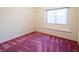 Charming bedroom with pink carpet and a window at 3109 Siena Cir, Las Vegas, NV 89128