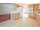 Kitchen with white appliances and wood cabinets at 3109 Siena Cir, Las Vegas, NV 89128