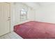 Living room with large window and pink carpet at 3109 Siena Cir, Las Vegas, NV 89128