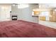 Living room with fireplace and adjoining kitchen at 3109 Siena Cir, Las Vegas, NV 89128