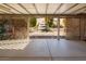 Covered patio with fountain view and lattice screens at 3109 Siena Cir, Las Vegas, NV 89128