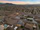 Aerial view of a single-Gathering home at sunset, showcasing the surrounding neighborhood at 311 Belfast St, Henderson, NV 89015