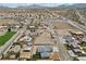 Aerial view of a single-Gathering home and surrounding neighborhood at 311 Belfast St, Henderson, NV 89015