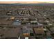 Aerial view of a single-Gathering home at sunset, showcasing the surrounding neighborhood at 311 Belfast St, Henderson, NV 89015